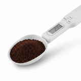 Digital kitchen spoon scale measuring ground coffee