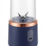 Close-up of stainless steel blades inside the portable USB blender