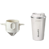 White coffee cup with a lid and handle on a white background