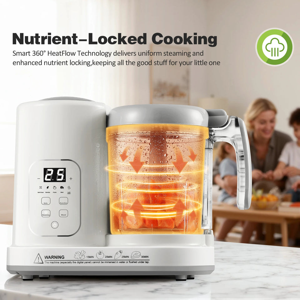 Stainless steel baby food maker with digital display on a marble countertop, family in the background.