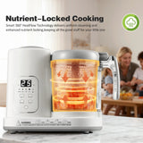 Stainless steel baby food maker with digital display on a marble countertop, family in the background.