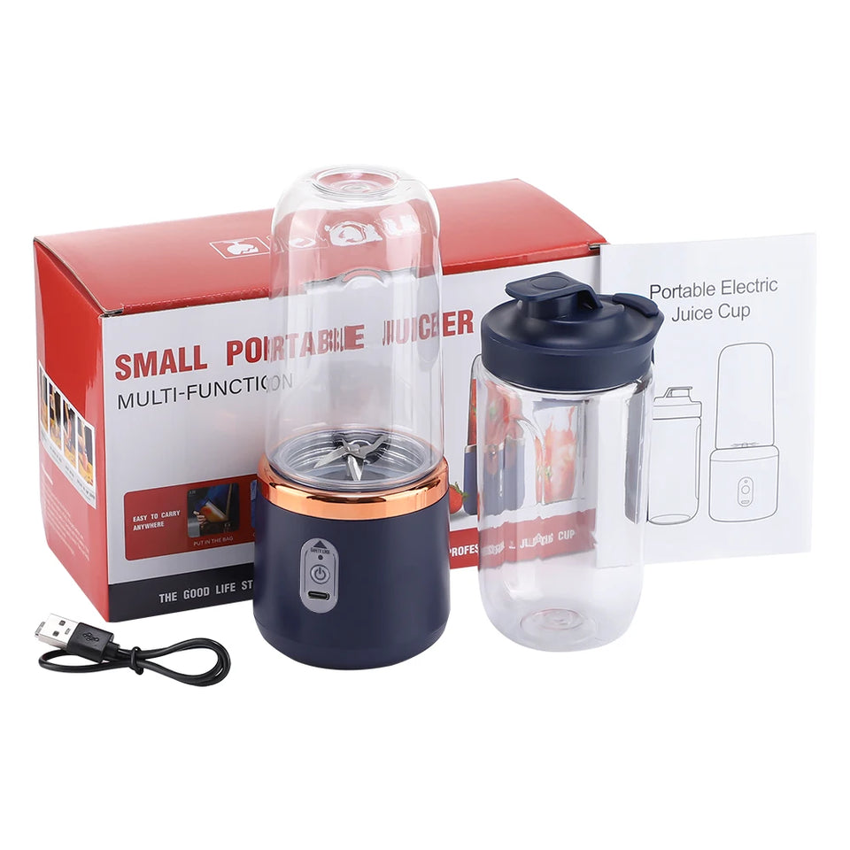 Portable electric juice maker with USB cable and packaging on a white background
