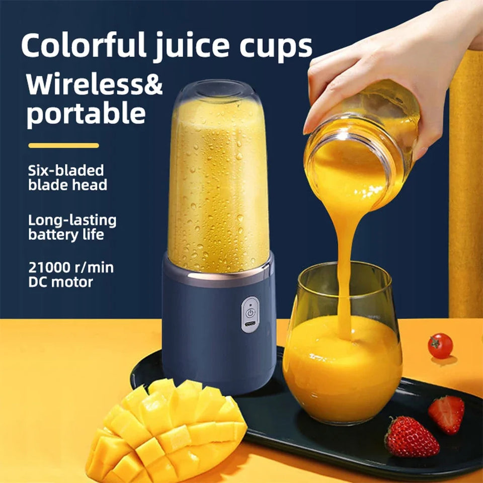 Portable blender with a glass of yellow juice, mango slices, and strawberries on a yellow background.
